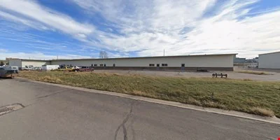 2,400 SF warehouse with 14ft Overhead door - industrial for sale in evanston, WY