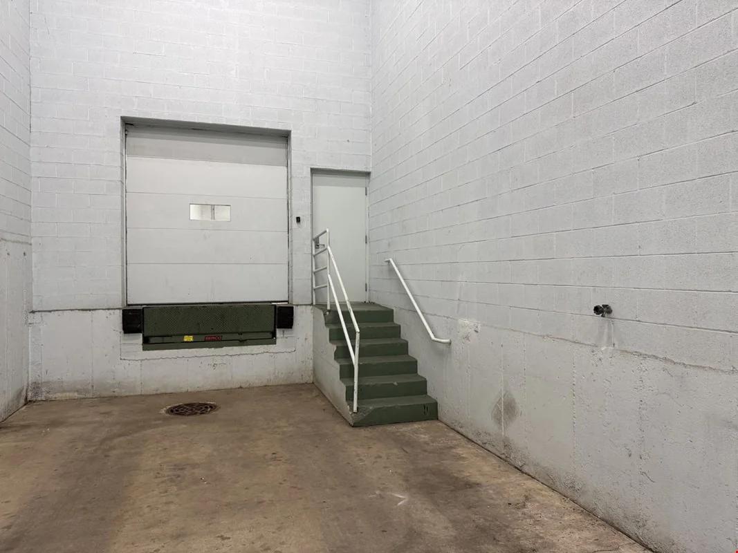 Load under roof: the truck pulls inside the building — Lease in Libertyville, IL, photo 7 of 8