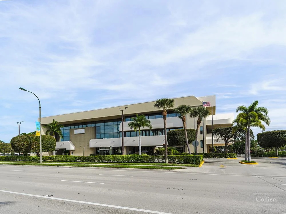 Boutique owner-user office building with oversized balconies and garage parking in North Palm Beach, FL